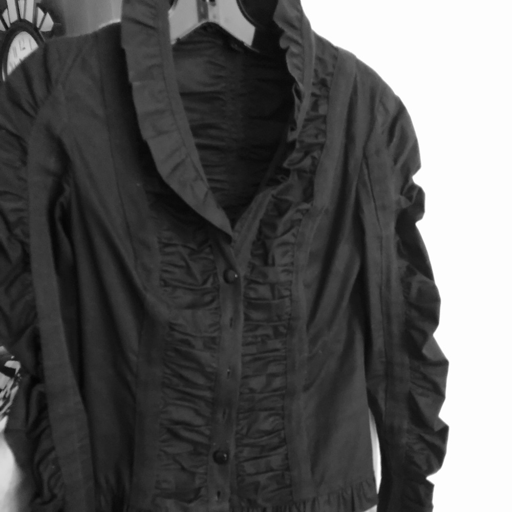 Betsy Johnson edgy blouse.